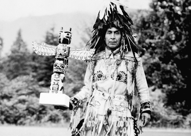 Matthias Joe -- Chief Joe Capilano -- with Totem Pole, circa 1930